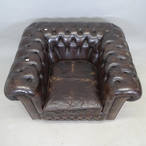 2593 - An Antique brown leather button-back upholstered Chesterfield Club chair, 106 x 70 x 92cm