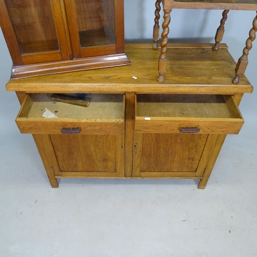 2599 - An early 20th century oak dresser base, with 2 fitted drawers and cupboards under, 121 x 94 x 50cm, ... 