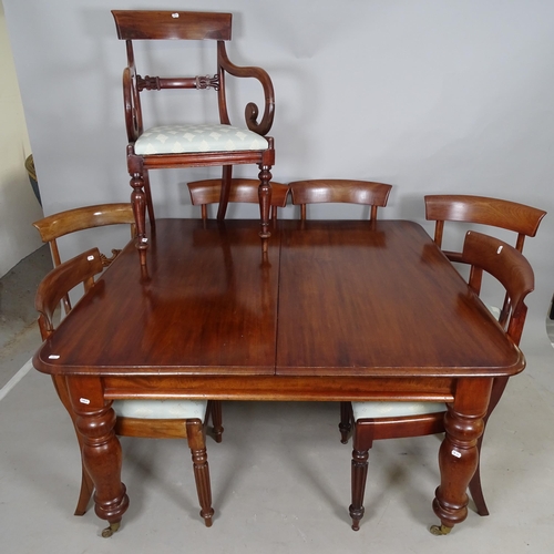 2607 - A 19th century mahogany draw-leaf dining table, with 2 spare leaves, 130cm extending to 238cm x 74 x... 