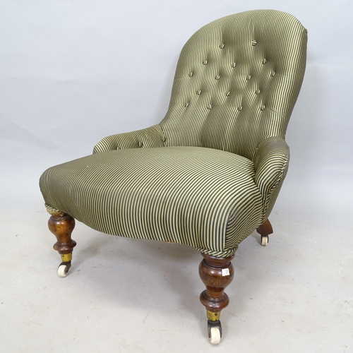 2608 - A Victorian button-back upholstered nursing chair, raised on mahogany legs