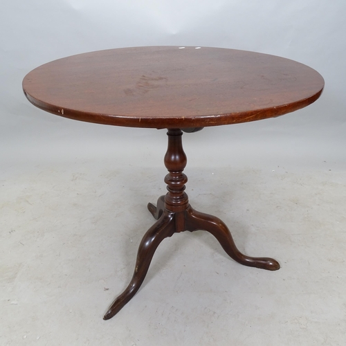 2635 - A Georgian mahogany circular tilt-top occasional table, with bird cage movement, on tripod base, 80c... 