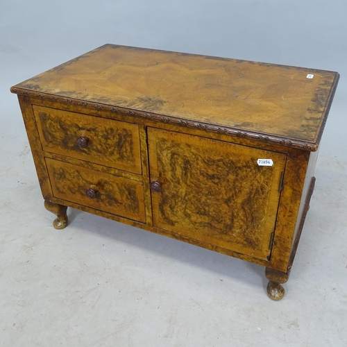 2646 - An Antique crossbanded burr-walnut veneered table-top cabinet, having 2 fitted drawers, a single doo... 