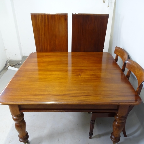 2607 - A 19th century mahogany draw-leaf dining table, with 2 spare leaves, 130cm extending to 238cm x 74 x... 