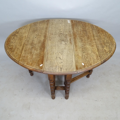 2628 - An Antique oak oval gateleg drop leaf table, 90cm x 75cm x 28cm