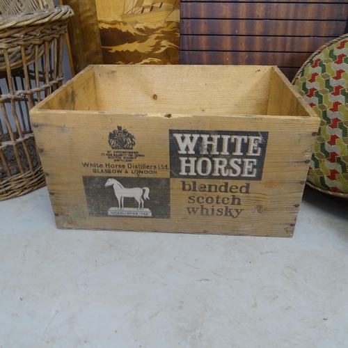 2650 - A Lloyd Loom laundry basket, a shove h'apenny board, a White Horse Whisky crate, 3 button footstools... 