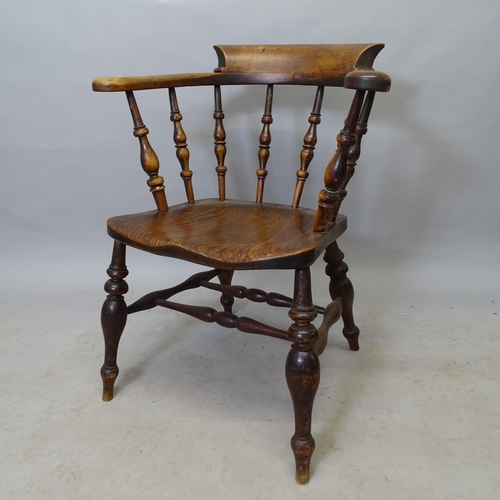 2655 - An elm-seated smoker's bow-arm chair