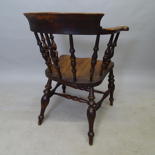 2655 - An elm-seated smoker's bow-arm chair