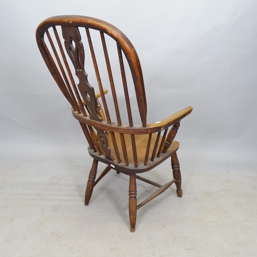 2658 - An elm-seated bow-arm Windsor kitchen chair