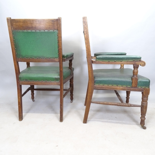 2666 - A pair of 1930s oak and green faux leather upholstered armchairs