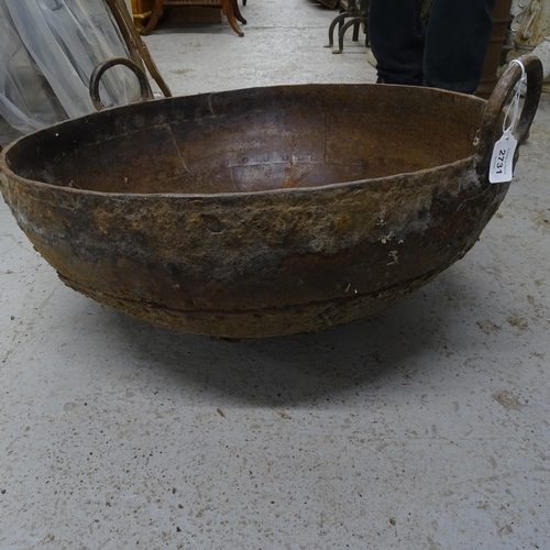 2732 - An Indian cast-iron Kadai, width 60cm
2731-2733 sold together