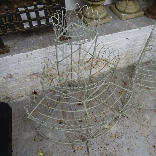 2742 - A pair of wrought-iron 3-tier wirework garden planters, height 85cm