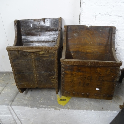 2747 - A pair of Chinese elm and steel-bound rice buckets, height 67cm