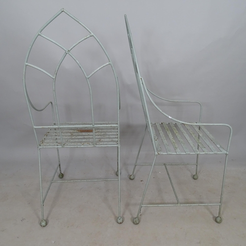 2748 - A pair of Gothic design wrought-iron garden armchairs