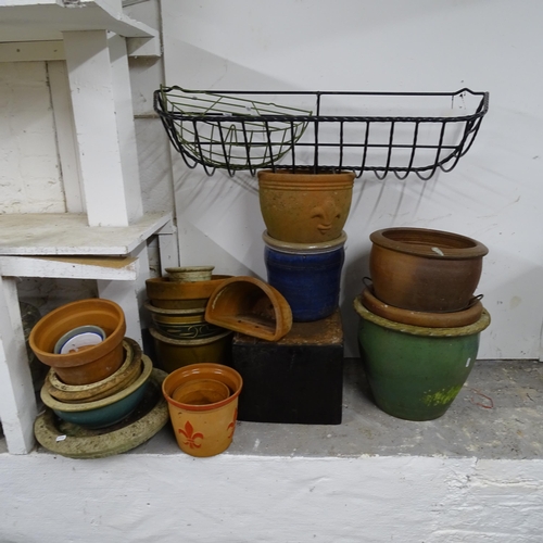 2750 - A large quantity of terracotta and other garden pots, window planter etc