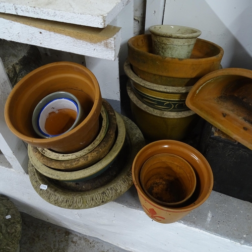 2750 - A large quantity of terracotta and other garden pots, window planter etc