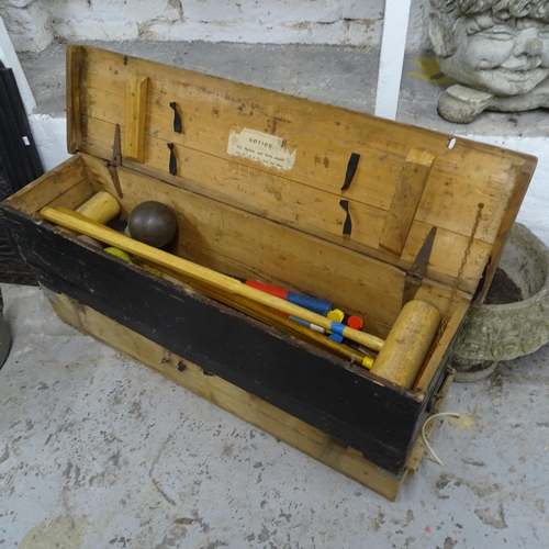 2752 - A Vintage pine-cased croquet set