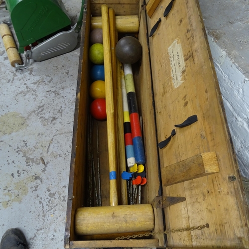 2752 - A Vintage pine-cased croquet set