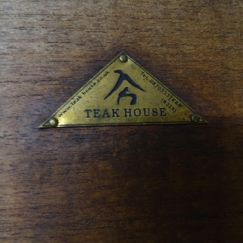 2762 - A pair of good quality teak steamer chairs, label for Teak House