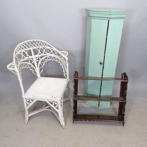 2770 - A wicker corner conservatory armchair, a mahogany hanging shelf, and a painted wooden corner cupboar... 