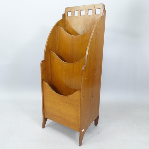 2788 - An Arts and Crafts Glasgow School magazine rack, circa 1910, 39cm x 102cm x 30cm