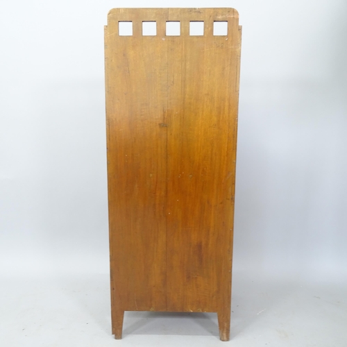 2788 - An Arts and Crafts Glasgow School magazine rack, circa 1910, 39cm x 102cm x 30cm