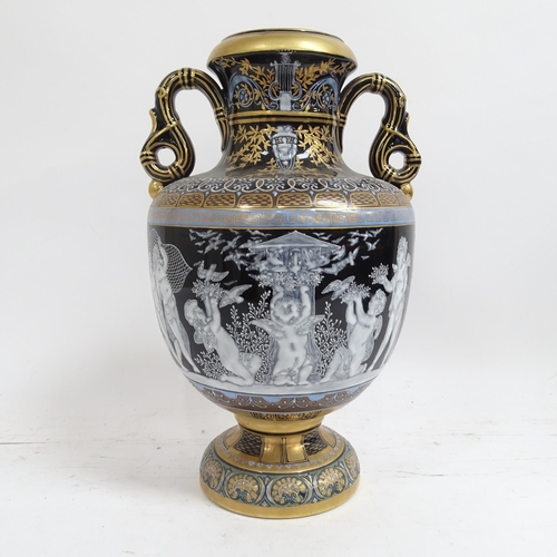 197 - An ornate painted and gilded porcelain vase and cover, height 38cm