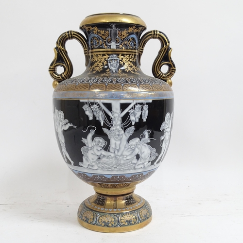 197 - An ornate painted and gilded porcelain vase and cover, height 38cm