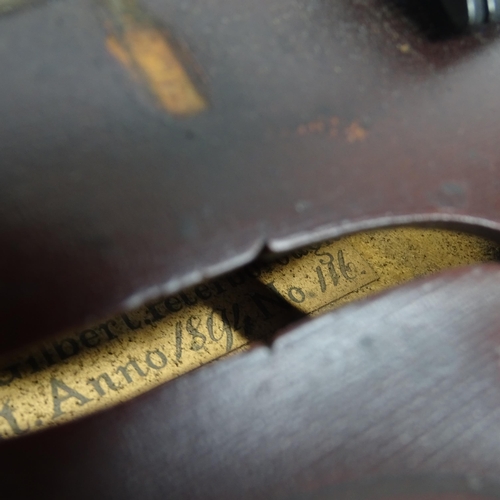 237 - A Vintage violin and bow in case, spare bow in case also