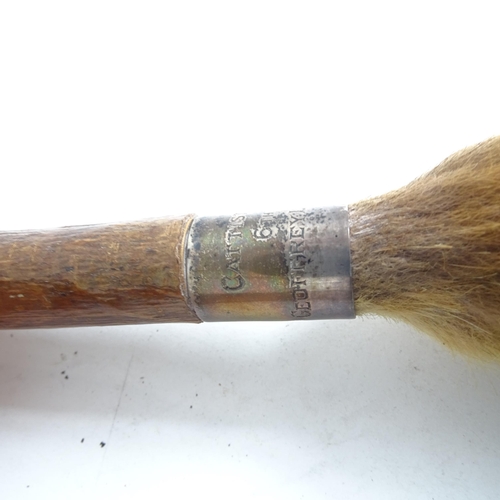 77 - TAXIDERMY - a fox head, on oak shield plaque, and a silver-mounted foxtail fly whisk (2)