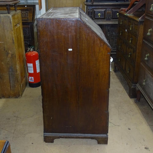 2182 - A Georgian oak bureau, with well fitted interior, and 2 short and 2 long drawers, on bracket feet, 9... 