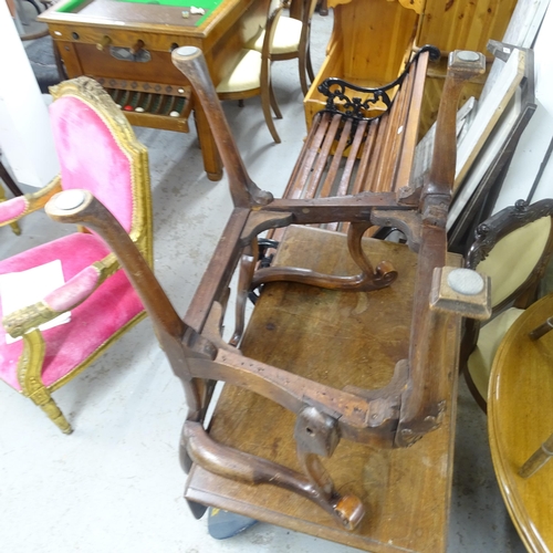 2673 - An Antique mahogany and upholstered open armchair, on cabriole legs with carved shell decoration