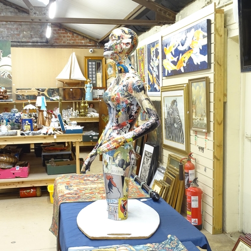 1866 - A decoupage decorated abstract 3/4 size mannequin, on board stand, figure height 115cm