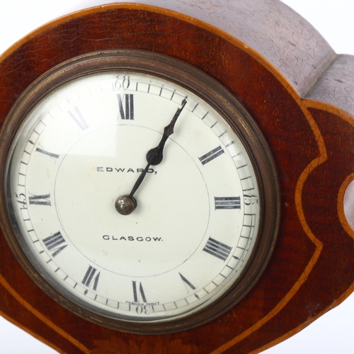 1001 - An Edwardian Art Nouveau mahogany-cased mantel clock of highly stylised form, with inlaid floral mot... 