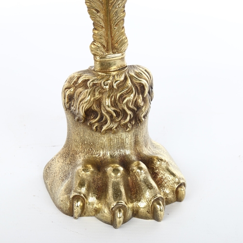 1005 - A Regency gilt-brass hairy paw design doorstop with lead-weighted base, height 41cm