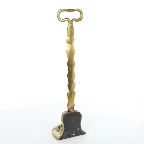 1005 - A Regency gilt-brass hairy paw design doorstop with lead-weighted base, height 41cm