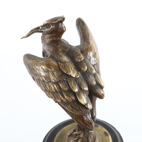 1036 - A 19th century patinated bronze sculpture of a heron, unsigned, on black slate socle base, height 20... 