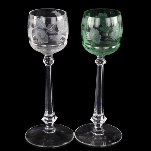 1038 - MOSER GLASS - a pair of green and clear glass long-stemmed glasses, with engraved floral bowls, heig... 