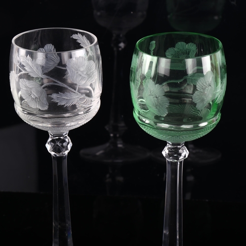 1038 - MOSER GLASS - a pair of green and clear glass long-stemmed glasses, with engraved floral bowls, heig... 