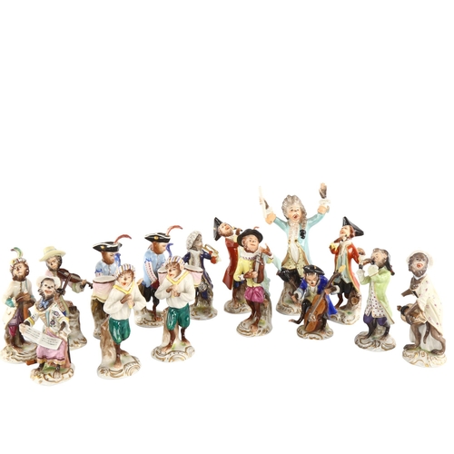 1040 - A collection of early 20th century German Volkstedt porcelain monkey band figures, largest height 15... 