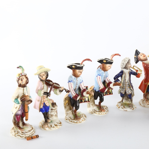 1040 - A collection of early 20th century German Volkstedt porcelain monkey band figures, largest height 15... 