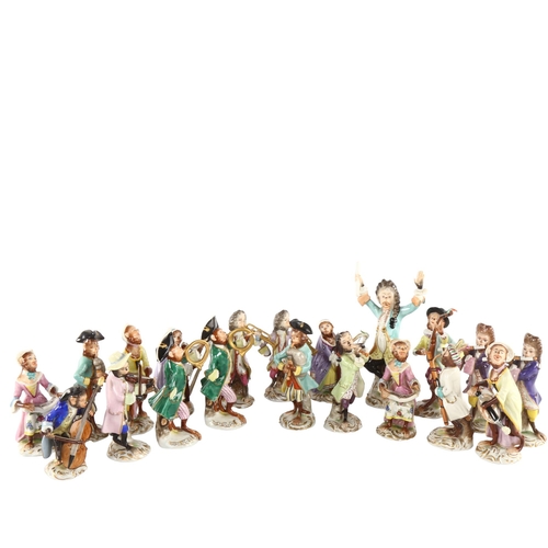 1041 - A collection of early 20th century German Volkstedt porcelain monkey band figures, largest height 15... 