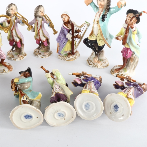 1041 - A collection of early 20th century German Volkstedt porcelain monkey band figures, largest height 15... 