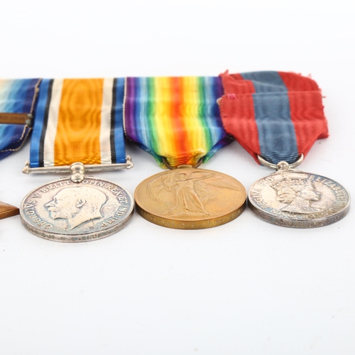 1053 - A group of 4 Great War and Faithful Service medals, awarded to Bmbr C E Brown RFA65664, comprising 1... 