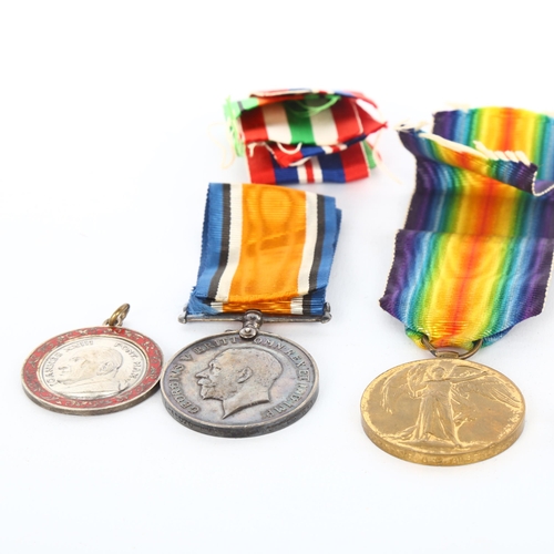 1055 - A collection of Great War and Second World War General Service medals, cap badges and medallions, Fi... 