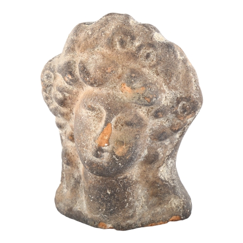 1089 - A Roman terracotta Classical head of the Goddess Faustina, approx 1st/2nd century AD, height 9cm