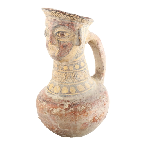 1090 - Indus Valley Ancient terracotta mask-headed jug, circa 2nd/3rd century BC, height 20cm