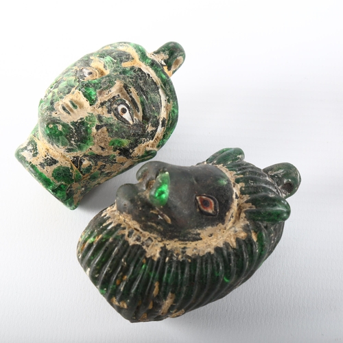 1093 - 4 Ancient Phoenician glass heads, circa 1st century BC, lion head height 6.5cm (4)