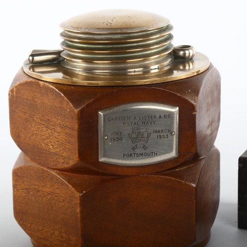 1101 - A brass and mahogany tobacco jar in the form of nuts and bolts, plaque dated 1953 Portsmouth, height... 