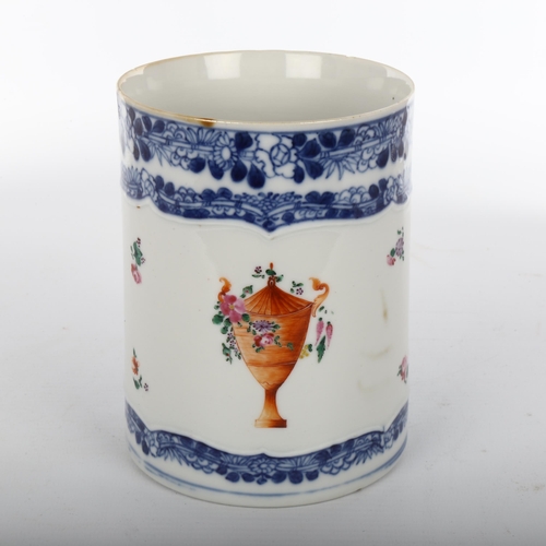 1105 - A Chinese 18th century blue and white porcelain mug, with floral painted panel, height 14cm