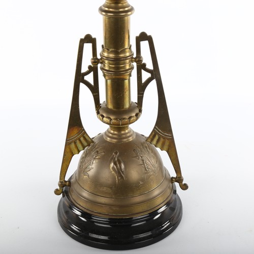 1010 - Victorian brass and blue glass duplex oil lamp, in the manner of Christopher Dresser, with embossed ... 